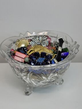 Assorted Jewelry In A Glass Bowl